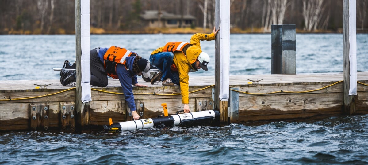 Deploying a subsurface vehicle, tube-shaped, from the GLRC dock.