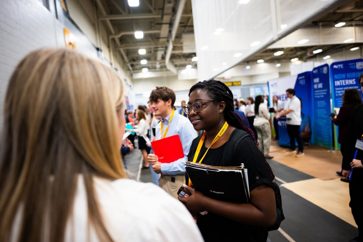 Student talking with Industry member at Career Fair