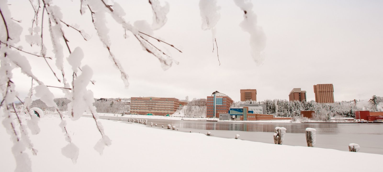Picture of the MTU campus in the winter from the Portage Canal.
