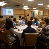 D80 Conference 2018 people at tables