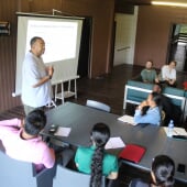 a person leading a presentation in a classroom