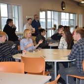 Students sitting at tables.