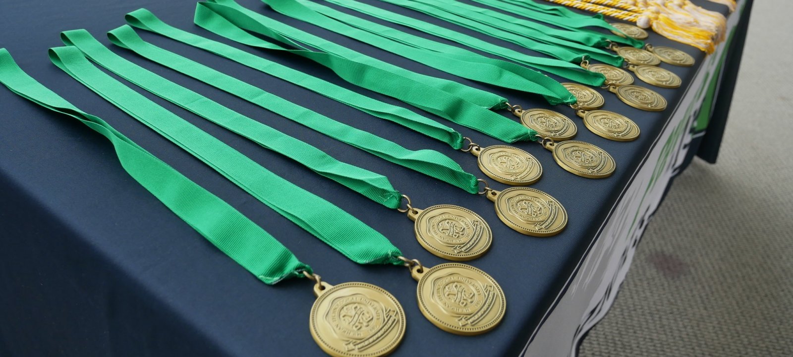 A table full of Honors medallions