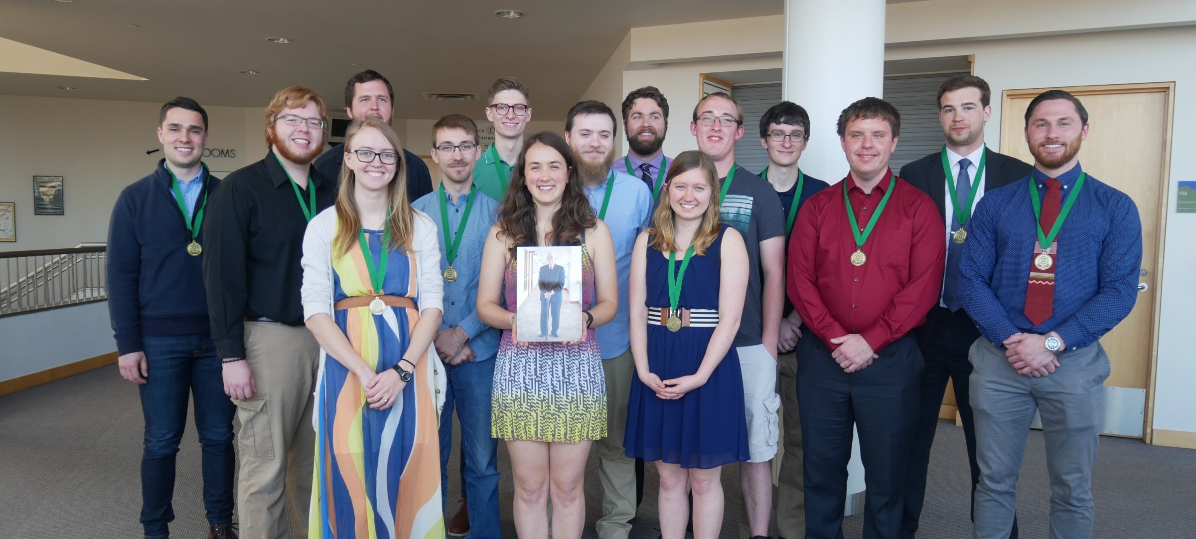 Group photo of students at the Pavlis Honors College Graduation Ceremony.