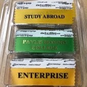 Name tag add-ons reading Study Abroad, Pavlis Honors College, and Enterprise