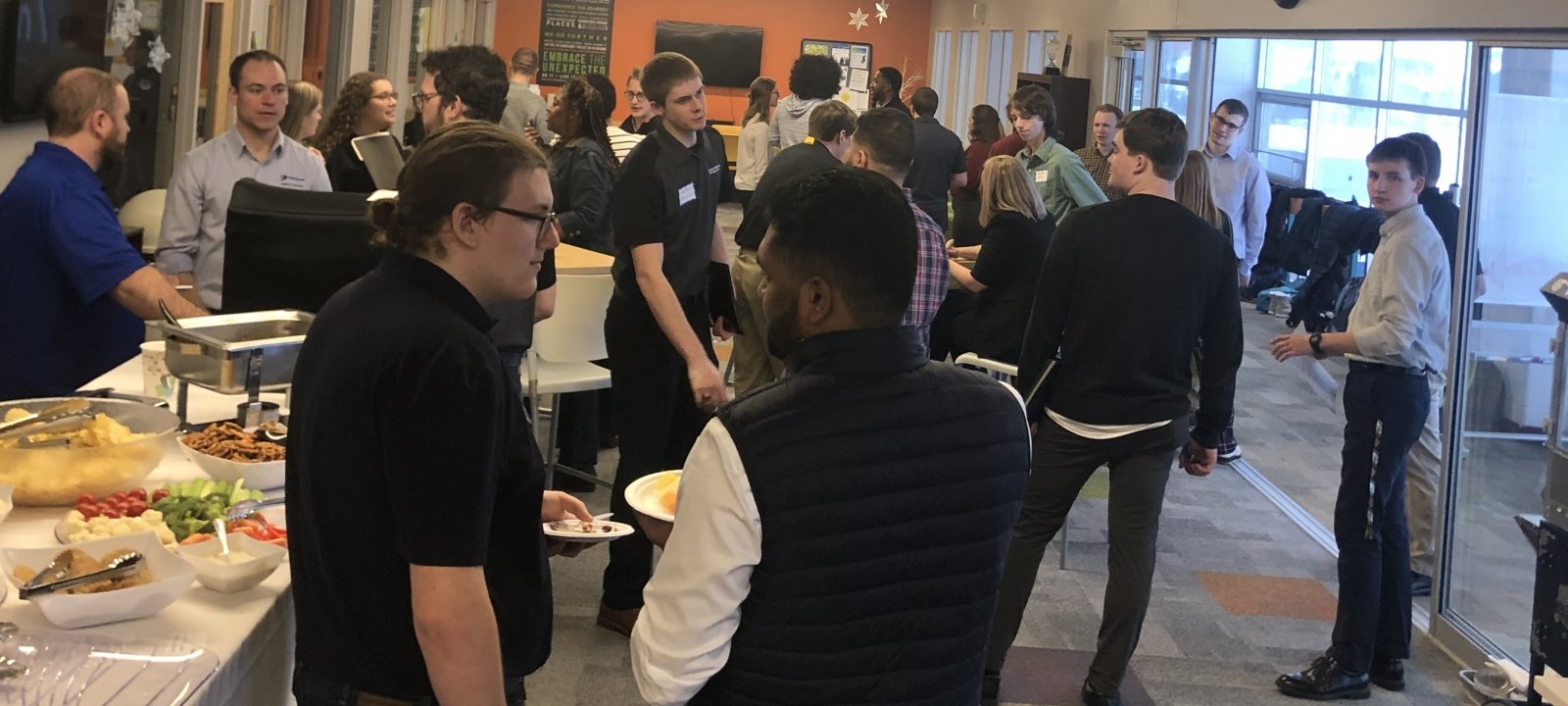 A mixer event with industry representatives and Michigan Tech students