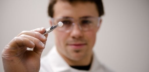 Ross Michaels holding fibrous protein collagen.