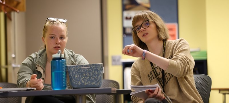 Humanities students in discussion during class