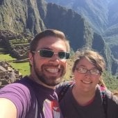 Two students posing for a selfie in the mountains of South America.