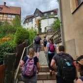 Students on a faculty-led study abroad in Germany ascend a staircase to Hohstein. Photo by Hayden.