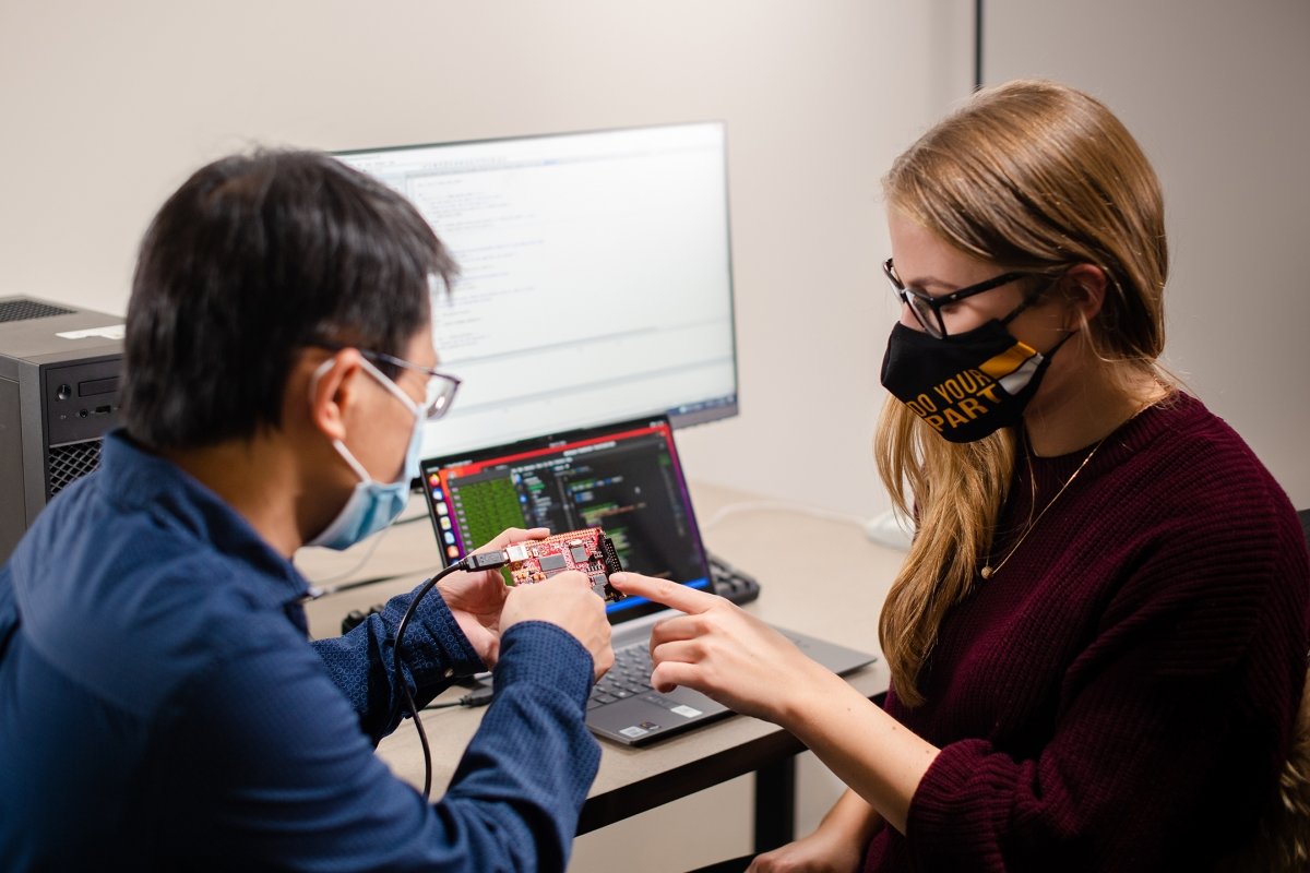 Bo Chen with a student