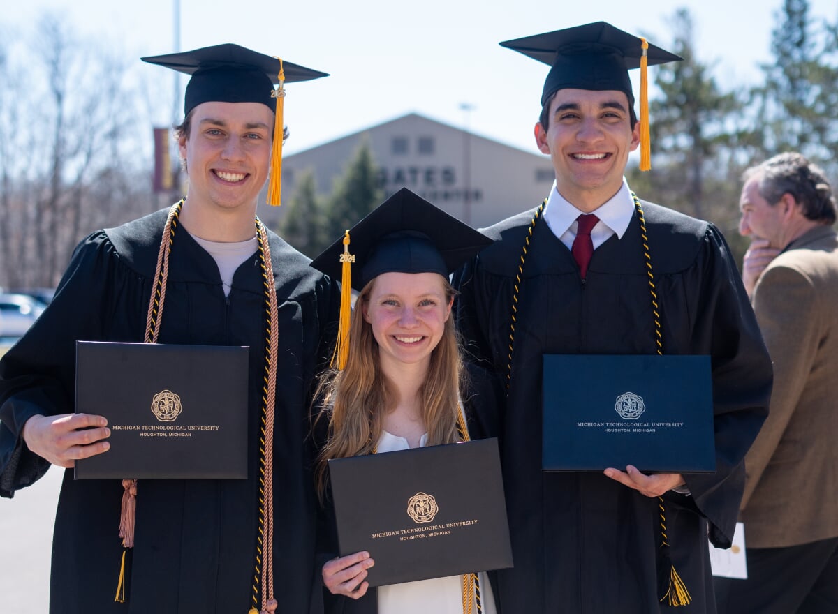 Parker, Danny, and Ingrid after graduating