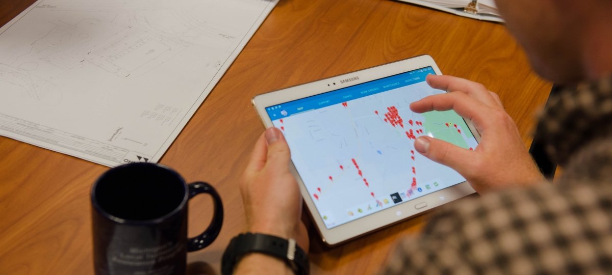 someone holding ipad