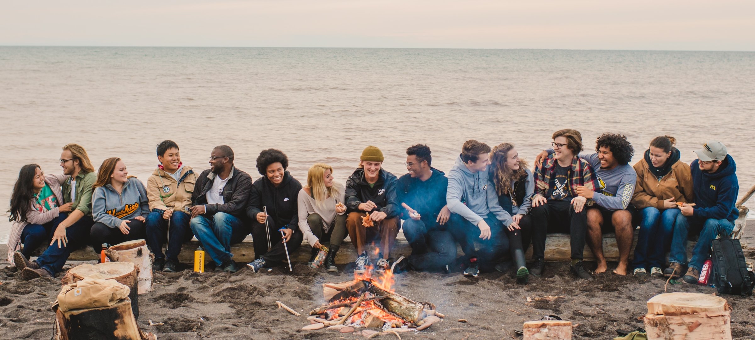 Group of students around a campfire