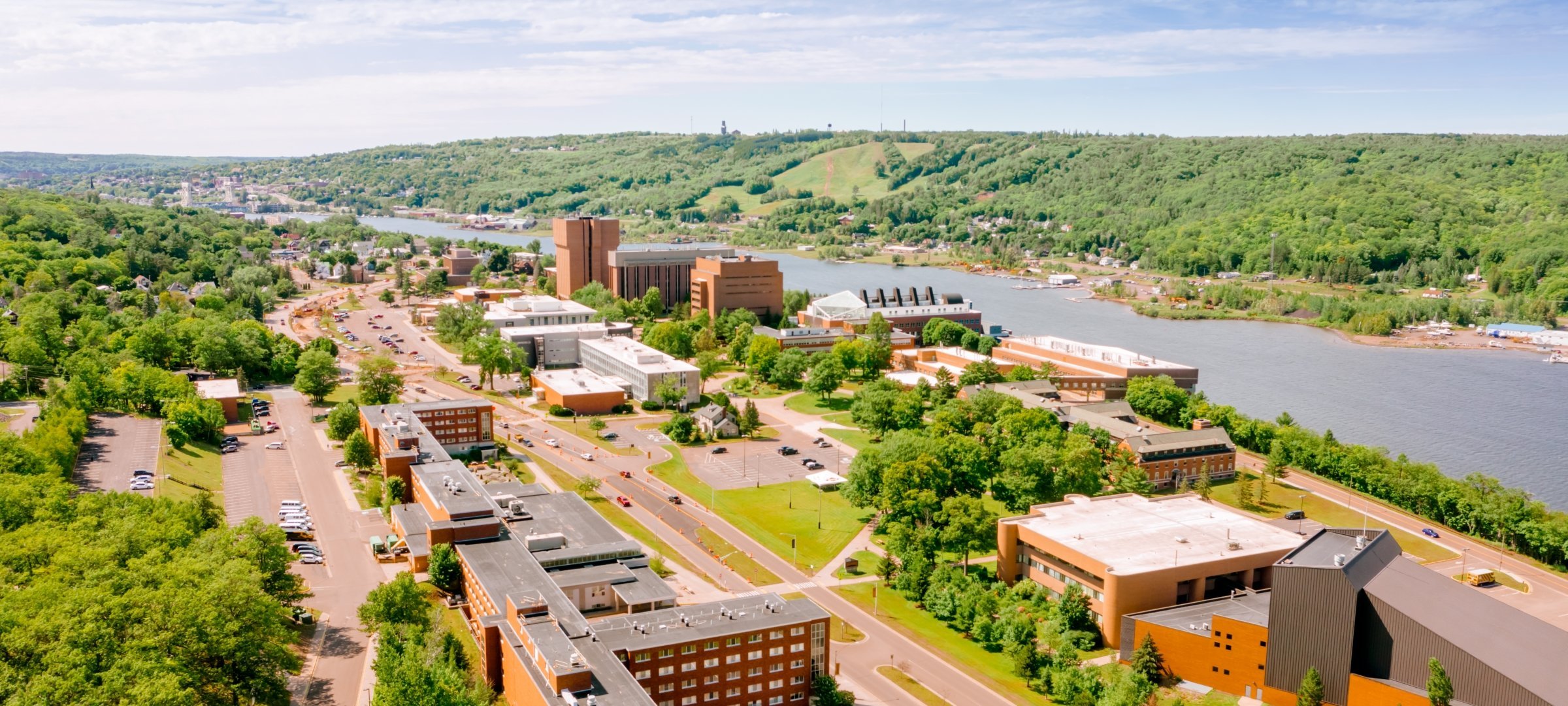 Michigan Tech's campus and Portage Waterway with Mont Ripley in the background.