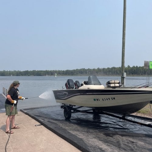 Person washing a boat