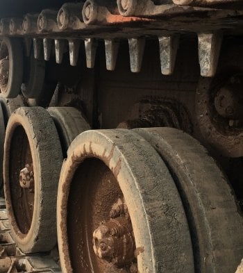 Close up of the bolts of a vehicle track.