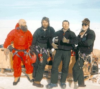 Researchers standing in the snow.