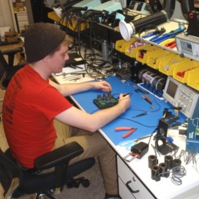 Student working on electronics