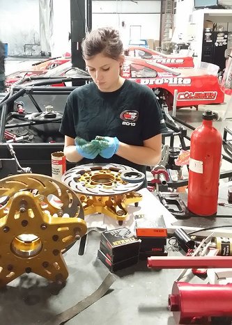 May putting her Tech mechanical engineering courses to good use at Coleman Racing Products, Menominee, Michigan.