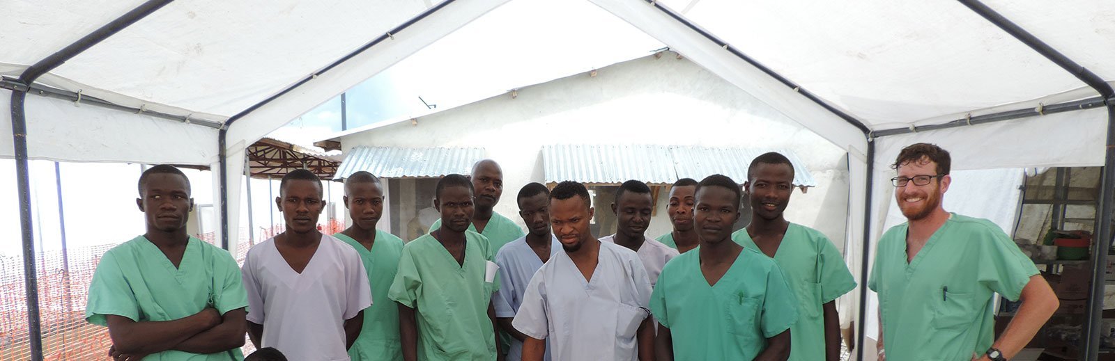 Water and sanitation team (Schreiner, far right) in Ebola Management Center (EMC) in Bo, Sierra Leone.