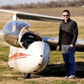 Todd Hahn next to a glider.