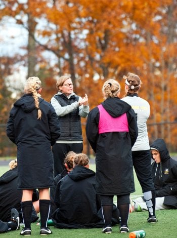 Coach Michelle Jacob speaks to MIchigan Tech's Women's Soccer Team.