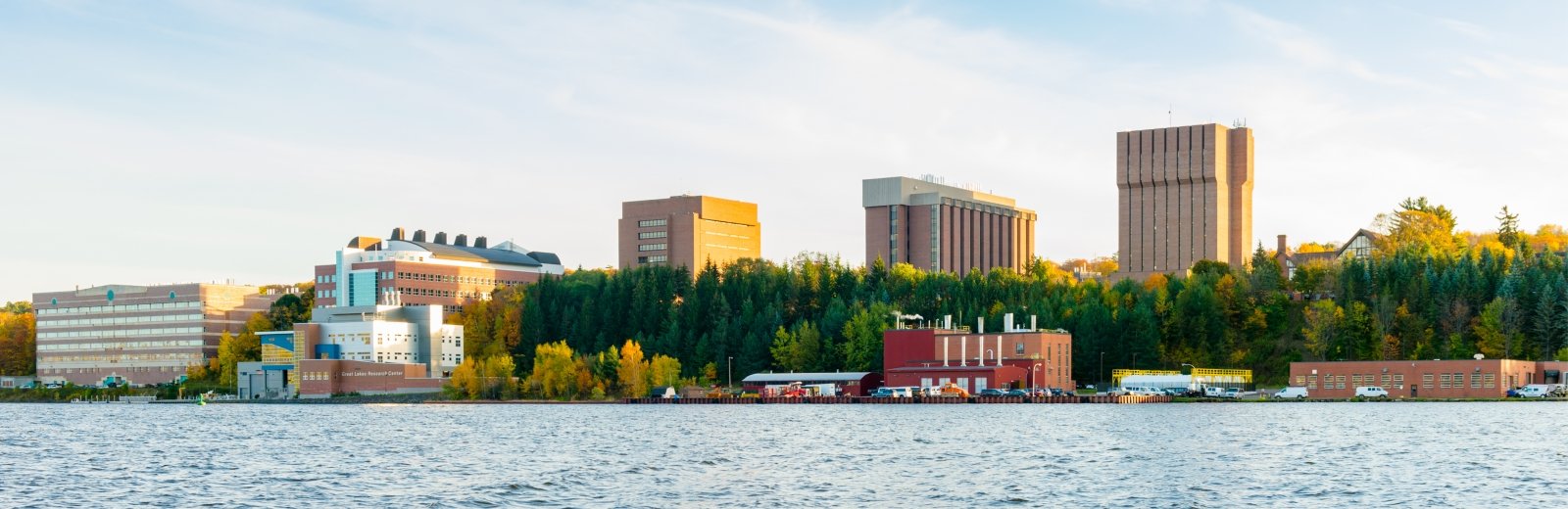 A view of campus from across the waterway.