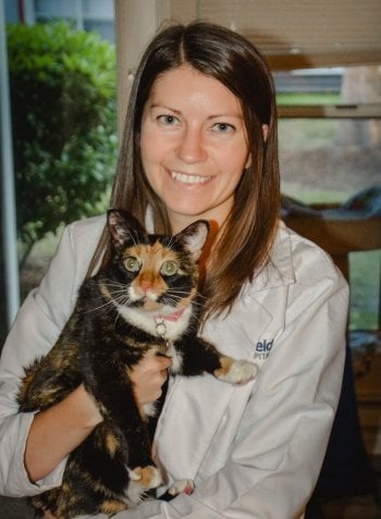 Anna Uhl holding a cat.