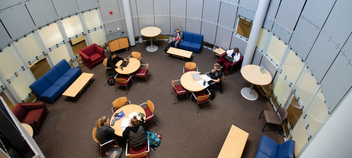 Student studying in the Rekhi Hall lounge.