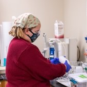 Person working on a sample in the lab.