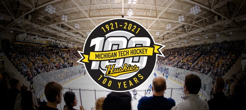 1921-2021 Michigan Tech Hockey 100 Years logo over  a background of the MacInnes Ice Arena.