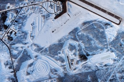 Aerial view of a snow-covered course.