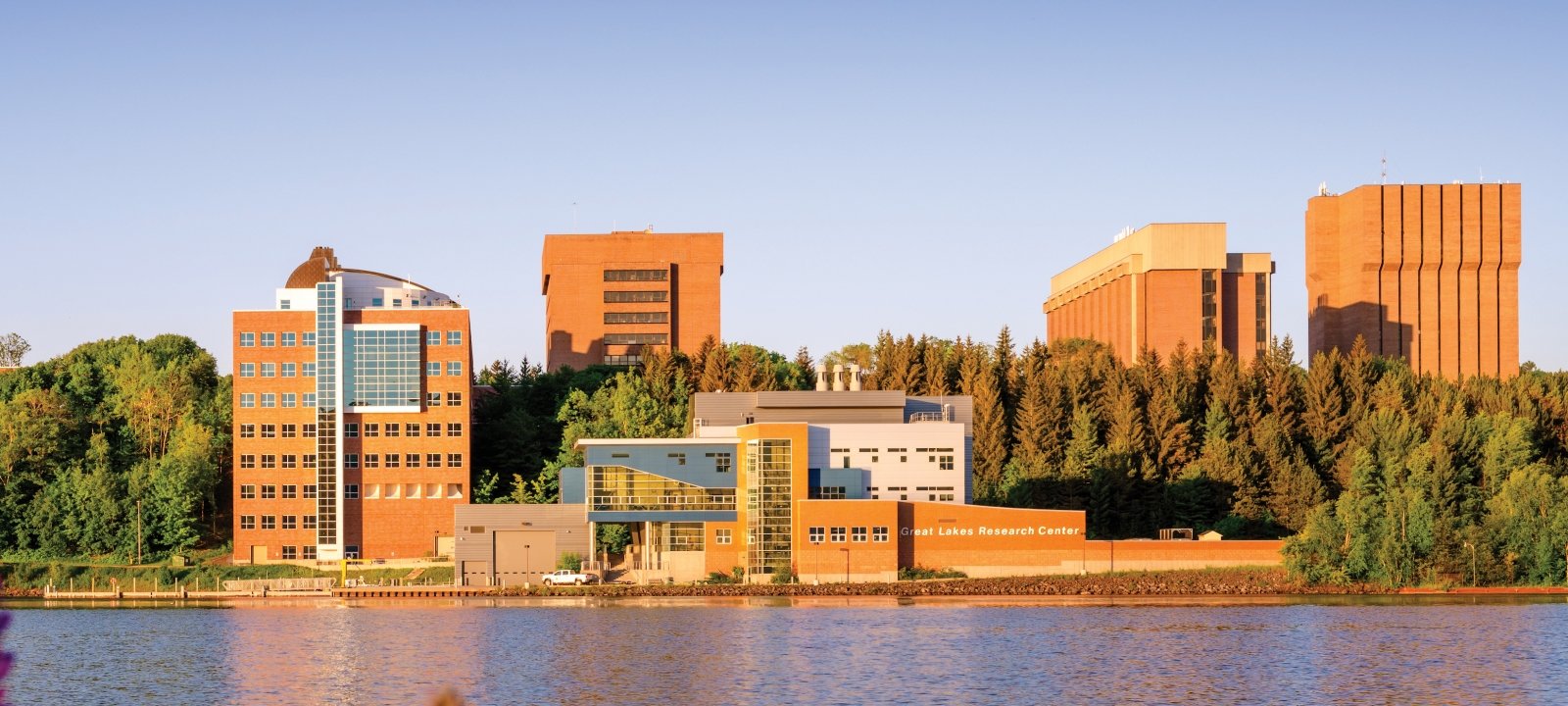 View of campus and the GLRC from across the Keweenaw Waterway.