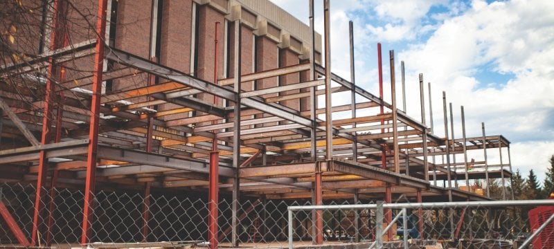 Beams attached to the Chem Sci building during construction of the H-STEM building.