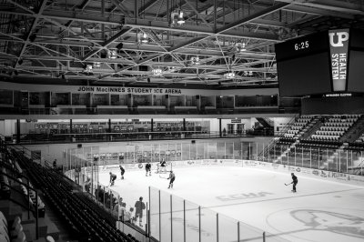 Teams playing hockey in the MacInnes Student Ice Arena.