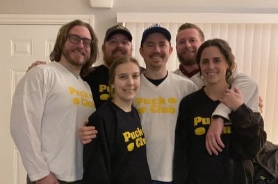 Ashley with five other members of the puck club in their jerseys.