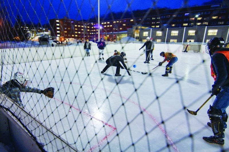 Students playing broomball.