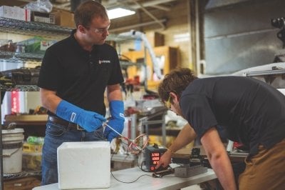 two of the team members performing a test.