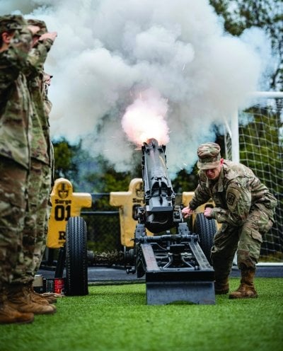 Cadet firing the cannon.