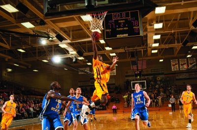 Tech basketball plater in the air for a layup during a game against Lake State.