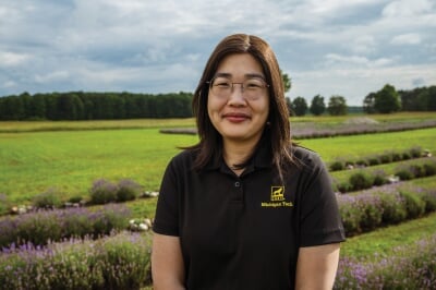 Jung Yun Bae standing in a lavender field.