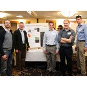 People around winning Senior Design poster.