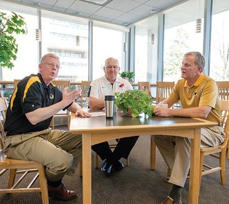 Mission Improbable Trio "Through this campaign, so many people have come to see Michigan Tech as a place of consequence," says Vice President for Advancement Shea McGrew, left, during a conversation with Tech Fund Chair George Butvilas, center, and President Glenn Mroz.