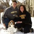 Matthew Carney and Rebekkah Bury with their dog.