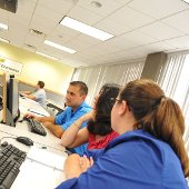 Students working together in a computer lab.