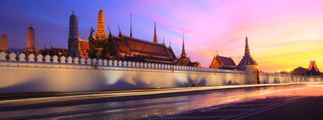 A wall and skyline in Thailand.