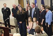 Frederick Jenness with his family receiving his purple heart.