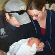 Amber and Rob Kumpf with baby Liam Mitchell.