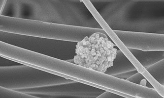 A microscopic photo of an aerosol particle taken at Michigan Tech's Applied Chemical and Morphological Analysis Laboratory (ACMAL)